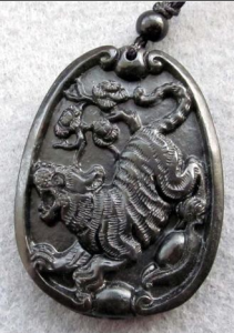 Royal black jade lucky tiger Yuanbao flower amulet